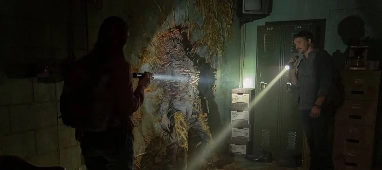 The Last of Us' characters looking at a Cordyceps zombie